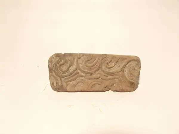 Sello de barro cocido