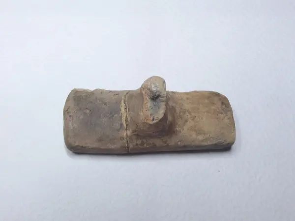 Sello de barro cocido
