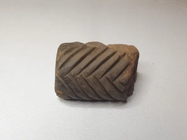 Sello de barro cocido