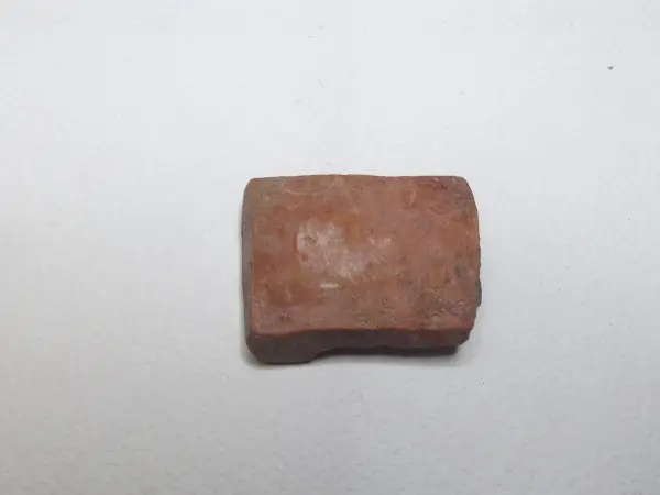 Sello de barro cocido