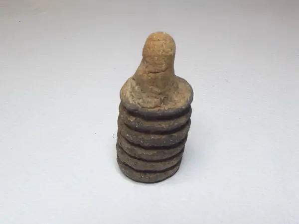 Sello de barro cocido