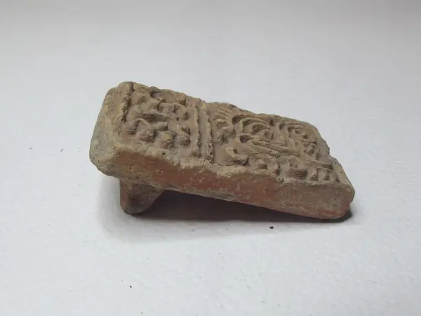 Sello de barro cocido
