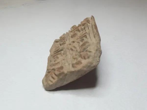 Sello de barro cocido