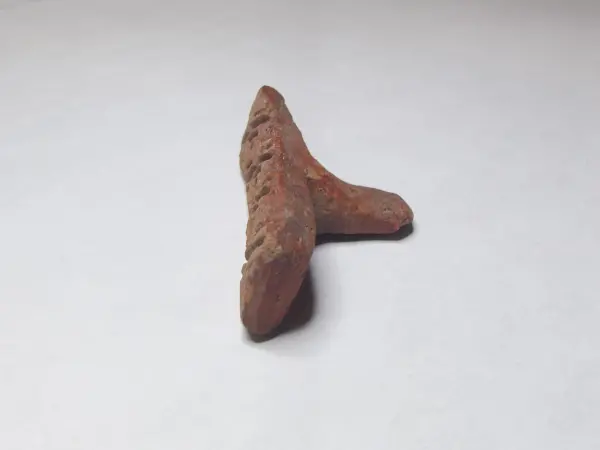 Sello de barro cocido