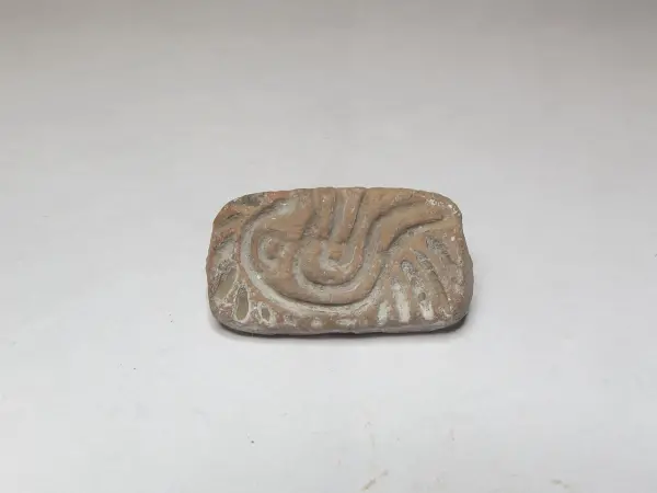 Sello de barro cocido