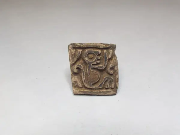 Sello de barro cocido