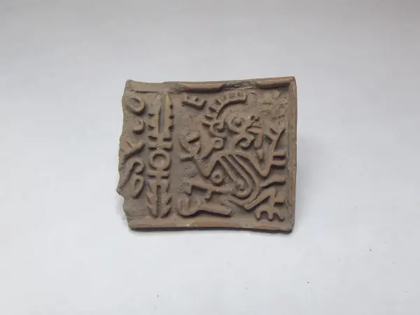 Sello de barro cocido