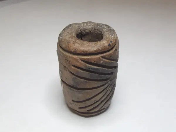Sello de barro cocido