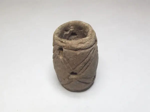 Sello de barro cocido