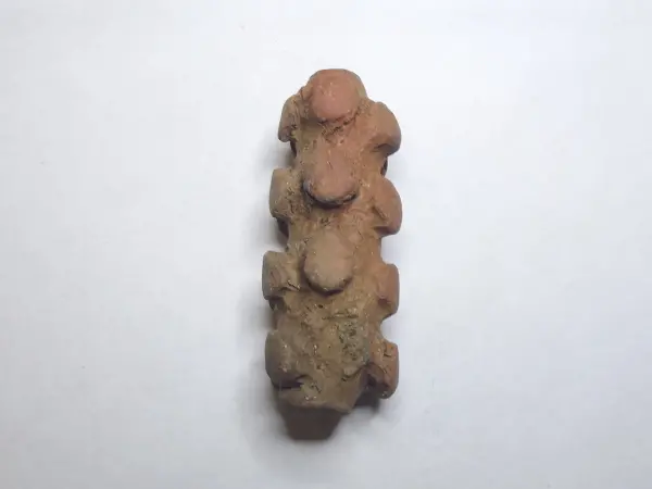 Sello de barro cocido