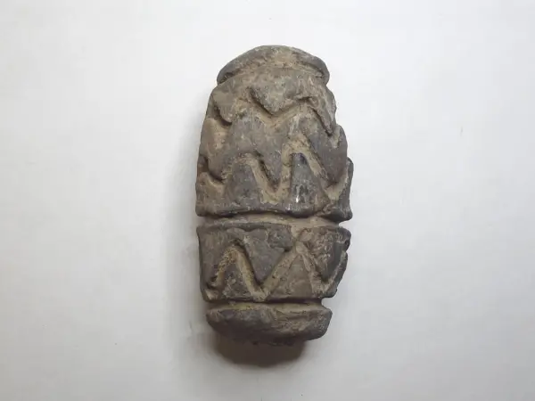 Sello de barro cocido