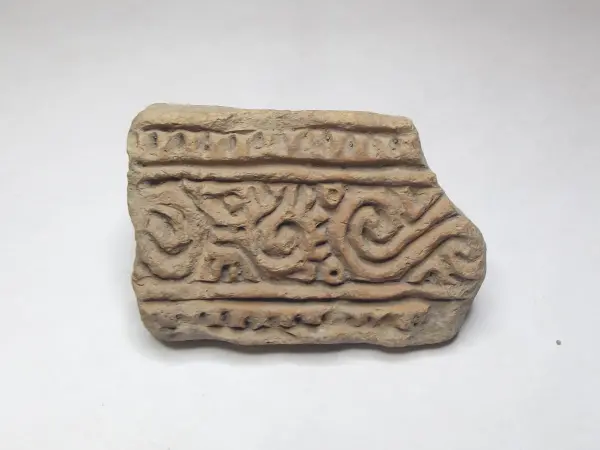 Sello de barro cocido