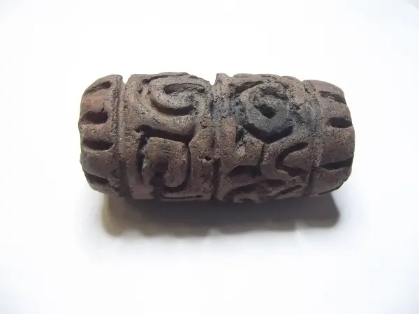 Sello de barro cocido