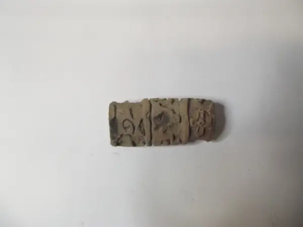 Sello de barro cocido