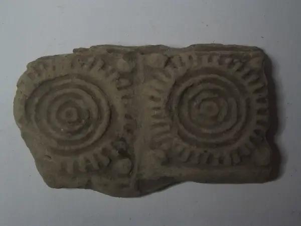 Sello de barro cocido