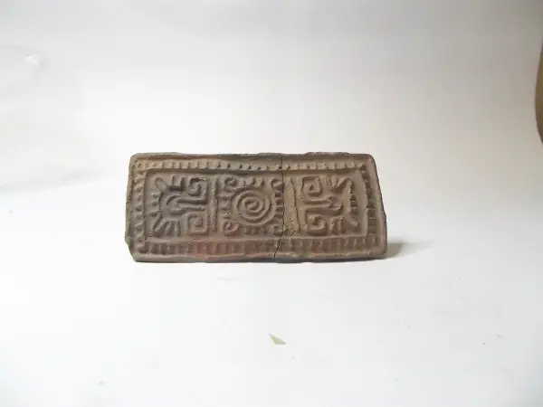 Sello de barro cocido