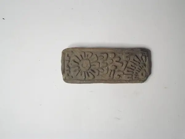 Sello de barro cocido
