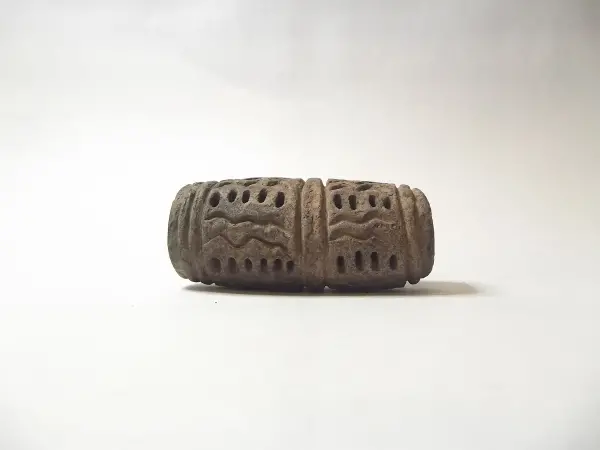 Sello de barro cocido