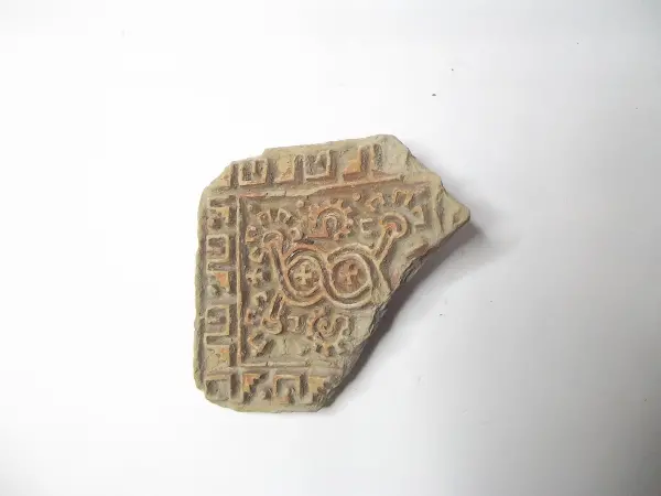 Sello de barro cocido
