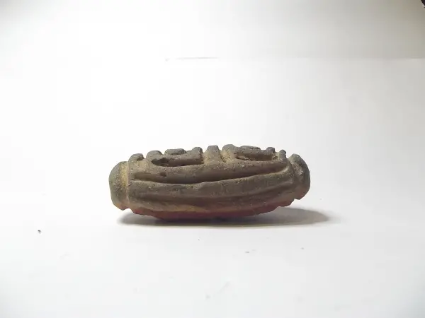 Sello de barro cocido
