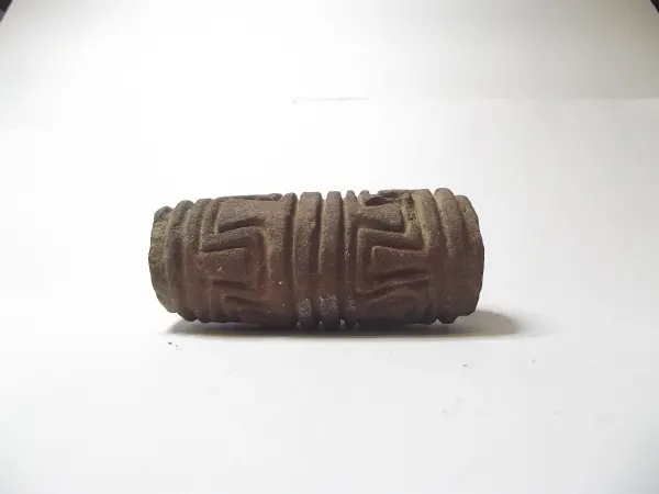 Sello de barro cocido