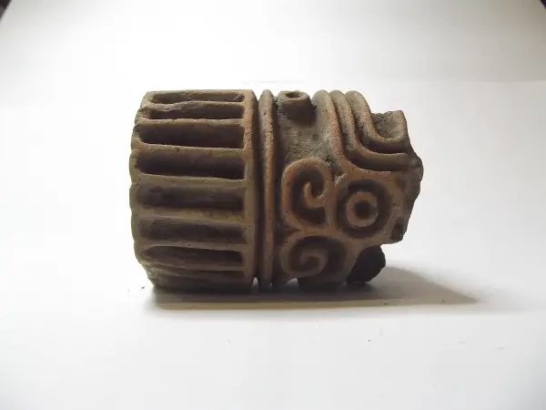 Sello de barro cocido