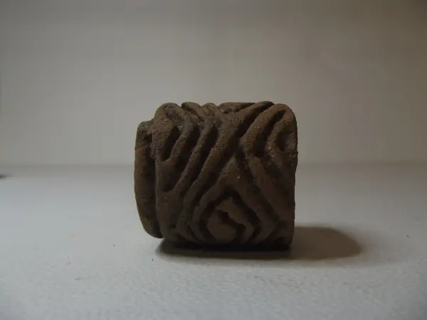 Sello de barro cocido