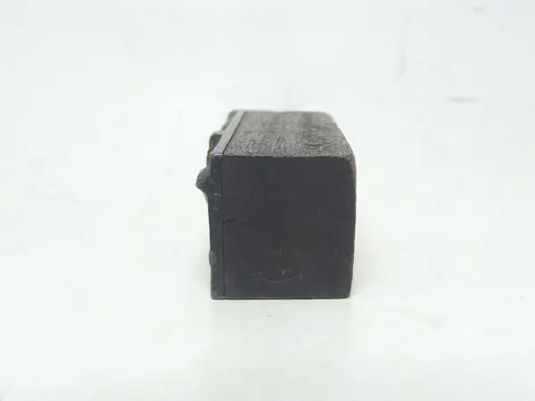 Grabado en plomo con base de madera