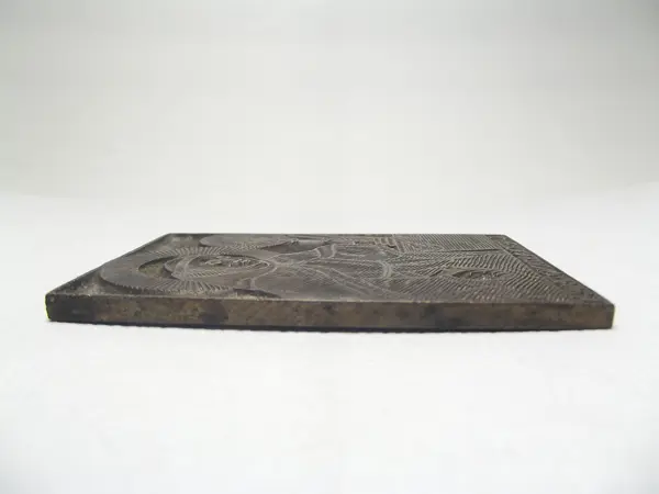 Grabado en bronce