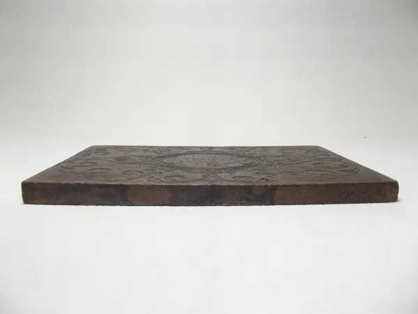 Grabado en bronce