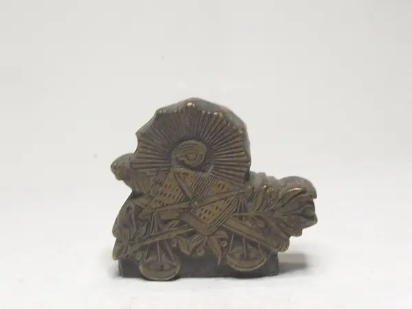Sello de bronce