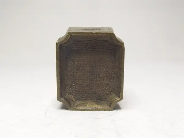 Sello de bronce