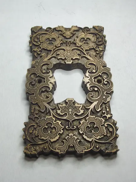 Grabado en bronce