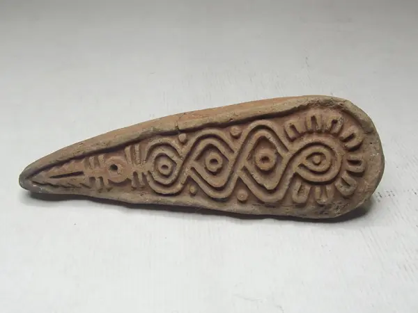 Sello de barro cocido